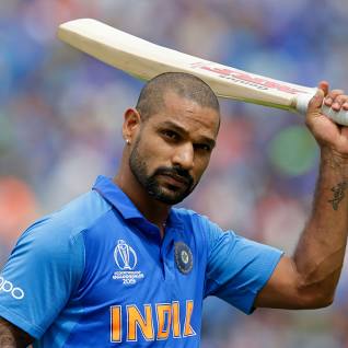 LONDON, ENGLAND - JUNE 09: Shikhar Dhawan of India walks off after being caught out during the Group Stage match of the ICC Cricket World Cup 2019 between India and Australia at The Oval on June 9, 2019 in London, England. (Photo by Henry Browne/Getty Images)